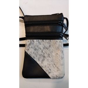 Cowhide cross body bag